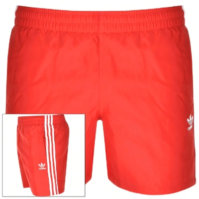 Shop Adidas Originals 3 Stripes Swim Shorts Red