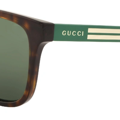Shop Gucci Gg0687s 003 Sunglasses Gold