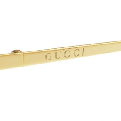 Shop Gucci Gg0478s Sunglasses Brown