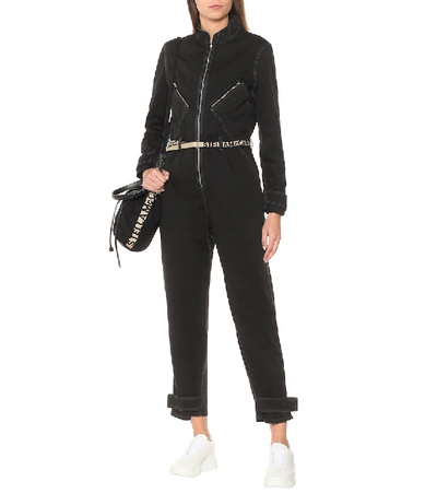 Shop Stella Mccartney Stretch-denim Jumpsuit In Black