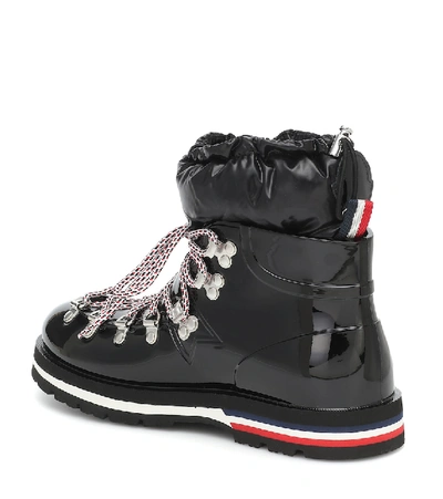 Shop Moncler Inaya Rubber And Down Snow Boots In Black