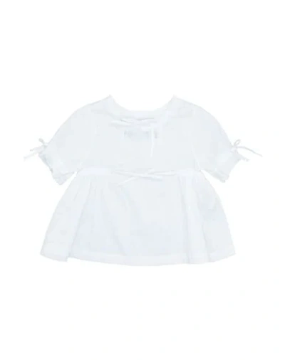 Shop Touriste Blouses In White