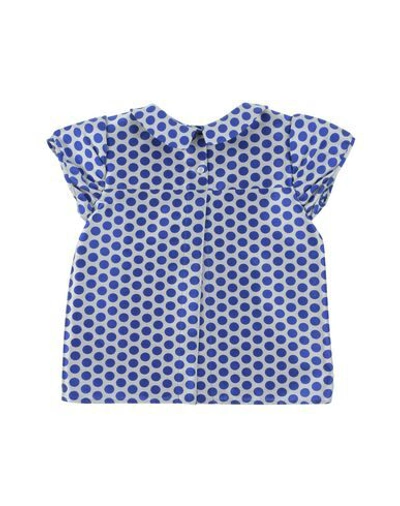 Shop Touriste Blouses In Blue