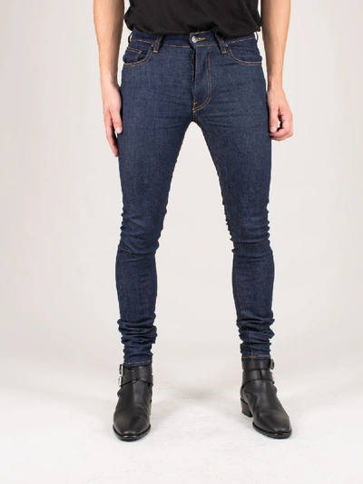 Shop Amiri Raw Stretch Skinny Jeans Raw Indigo In Blue