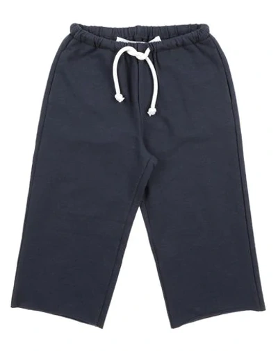 Shop Touriste Casual Pants In Dark Blue