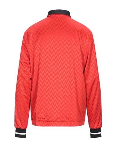 Shop Hummel Jacket In Coral