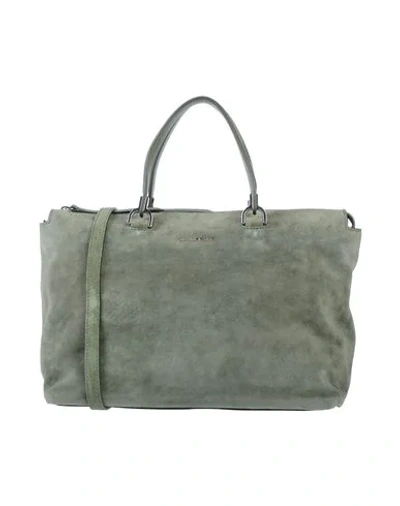 Shop Coccinelle Handbag In Military Green