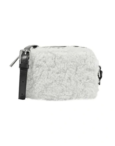 Shop Sandro Handbags In White