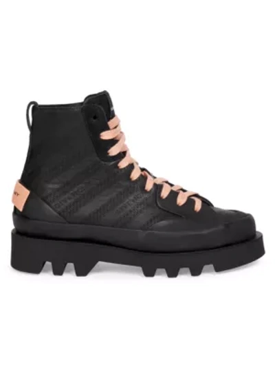 Shop Givenchy Lug-sole Logo Leather Combat Boots In Black