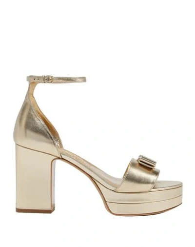 Shop Ferragamo Sandals In Gold