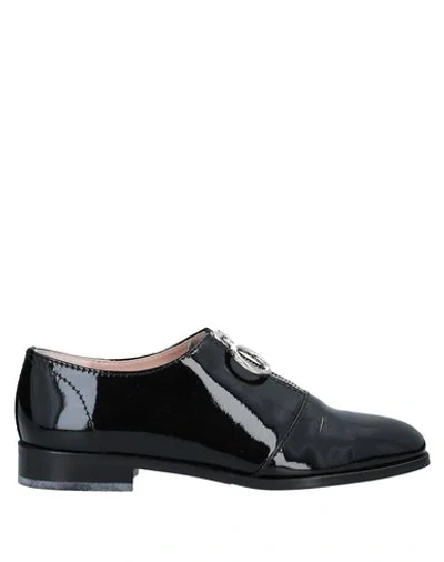 Shop Boutique Moschino Loafers In Black