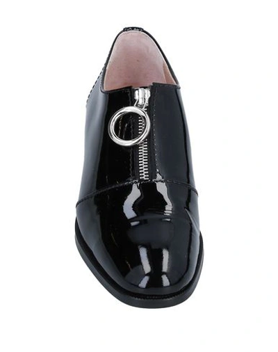 Shop Boutique Moschino Loafers In Black