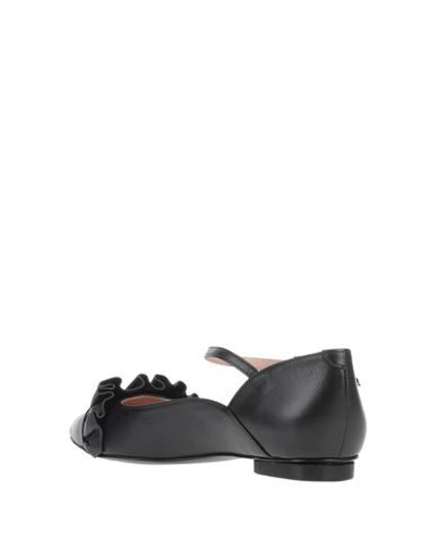 Shop Boutique Moschino Ballet Flats In Black