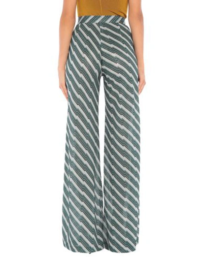 Shop Alcoolique Pants In Green