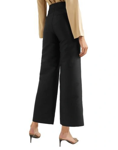 Shop Totême Pants In Black