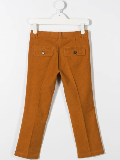 Shop Touriste Straight Leg Trousers In Brown
