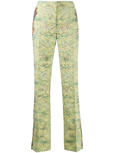 Shop Moschino Floral Pattern Flared Trousers In Green