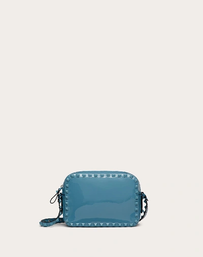 Shop Valentino Garavani Small Rockstud Patent Leather Crossbody Bag In Light Blue