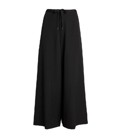 Shop Yohji Yamamoto Wide-leg Drawstring Trousers