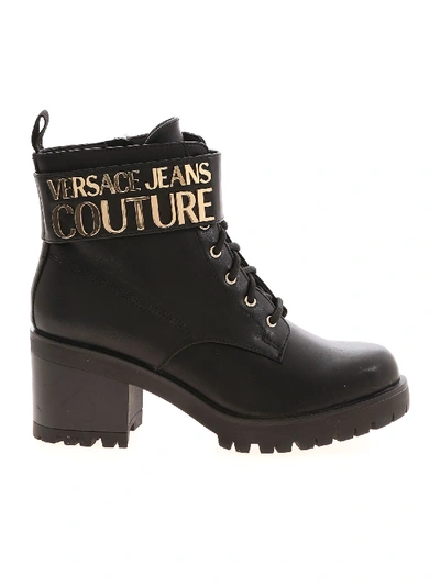 Shop Versace Jeans Couture Golden Metal Logo Ankle Boots In Black