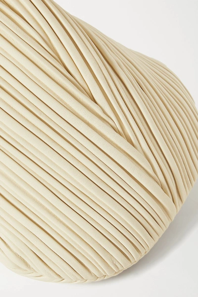 Shop Neous Pluto Pleated Leather Clutch In Cream