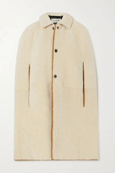 Shop Saint Laurent Suede-trimmed Shearling Cape In White