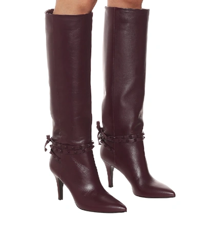 Shop Valentino Rockstud Flair Leather Knee-high Boots In Red