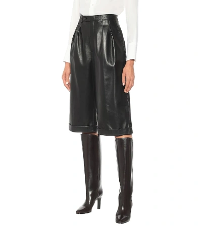 Shop Saint Laurent Leather Bermuda Shorts In Black