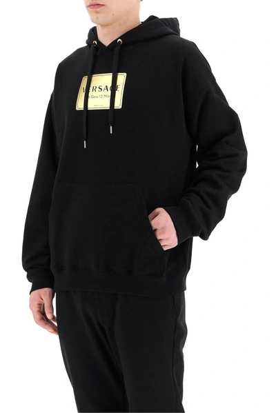 Shop Versace Logo Hooded Sweatshirt In Black