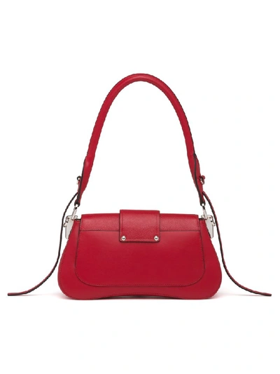 Shop Prada Sidonie Buckled Shoulder Bag In Red