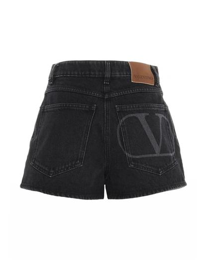 Shop Valentino Logo Denim Shorts In Black
