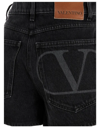 Shop Valentino Logo Denim Shorts In Black