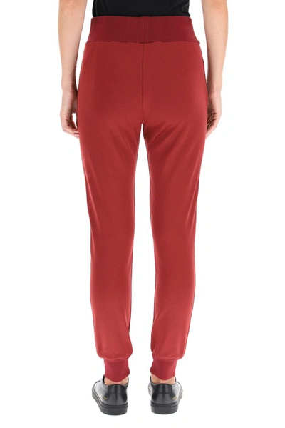 Shop Fendi Ff Motif Track Pants In Red