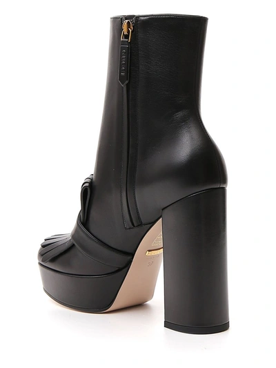 Shop Gucci Gg Marmont Heeled Ankle Boots In Black