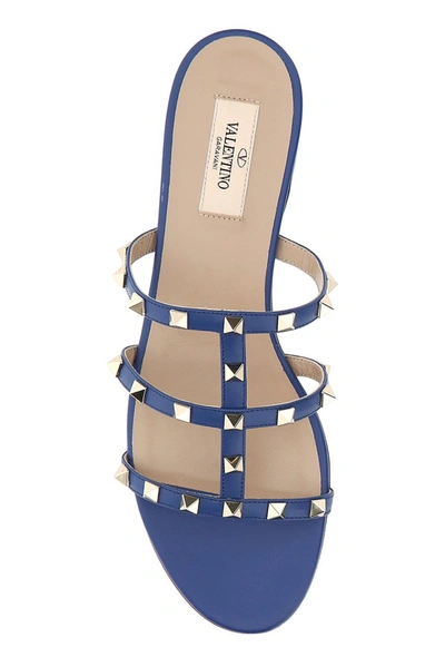 Shop Valentino Garavani Rockstud Flat Slide Sandals In Blue