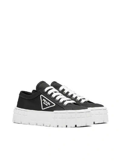 Shop Prada Tyre Sole Platform Sneakers In Black