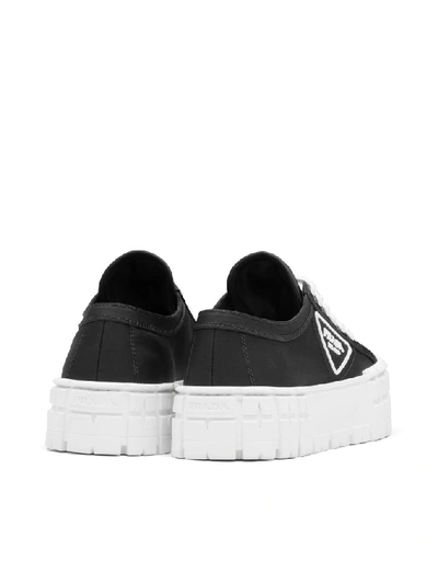 Shop Prada Tyre Sole Platform Sneakers In Black