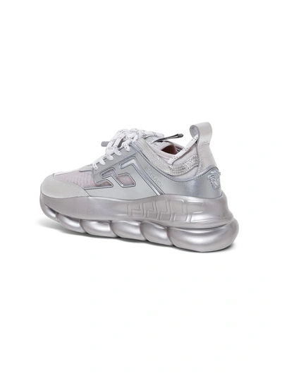 Shop Versace Metallic Chain Reaction Sneakers In Silver