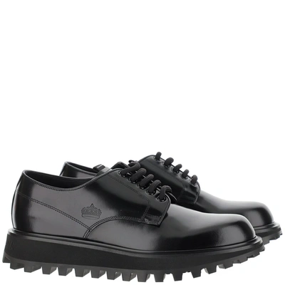Shop Dolce & Gabbana Logo Embossed Derby Shoes In Black