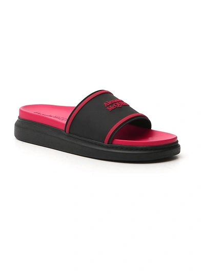 Shop Alexander Mcqueen Embossed Logo Slides In Red