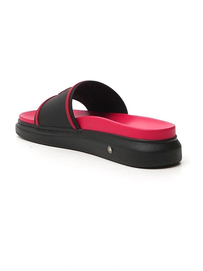 Shop Alexander Mcqueen Embossed Logo Slides In Red