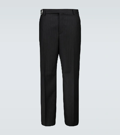 Shop Valentino Pinstriped Wool Pants In Black