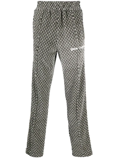 GEOMETRIC-PRINT TRACK PANTS