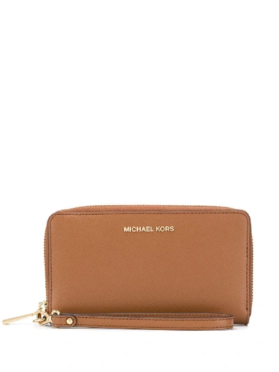 Shop Michael Michael Kors Zip-around Logo Wallet In Brown