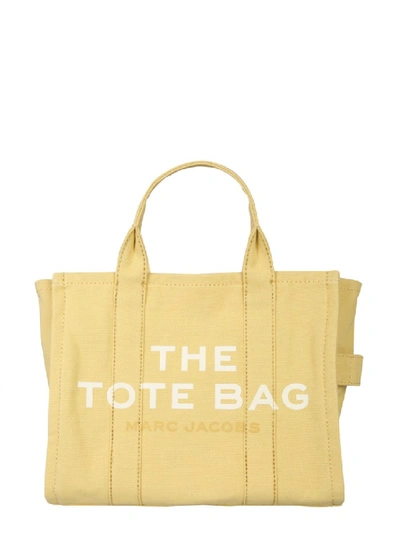 Shop Marc Jacobs The Traveler Small Beige Fabric Tote In Yellow