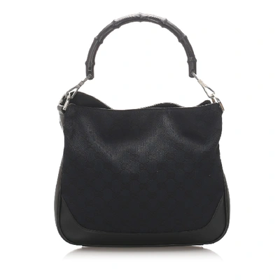 Shop Gucci Bamboo Gg Canvas Handbag In Black