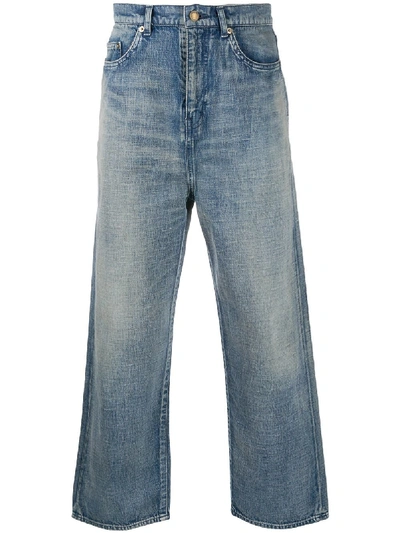 Shop Saint Laurent Stonewashed Wide-leg Jeans In Blue