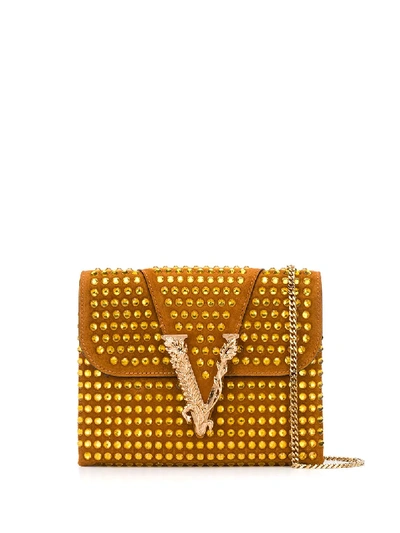 Shop Versace Virtus Studded Clutch In Brown