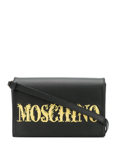 Shop Moschino Logo-embroidered Clutch In Black