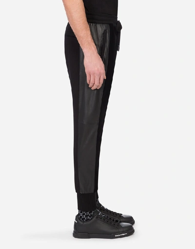 Shop Dolce & Gabbana Velvet Jogging Pants With Leather Bands